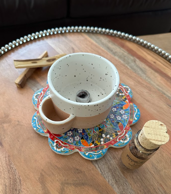 Rituals can be found in burning loose incense, palo santo, sage.